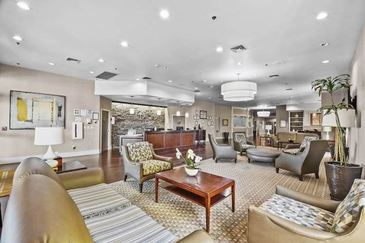 reception area with sofa tables and chairs